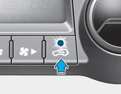 Hyundai Tucson: <b>Outside thermometer</b>. The air intake control button is used to select the outside (fresh) air position