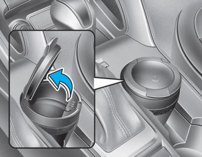 Hyundai Tucson: Cigarette lighter (if equipped). To open the ashtray cover: