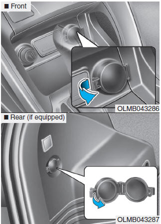 Hyundai Tucson: Cup holder. The power outlets are designed to provide power for mobile telephones or other