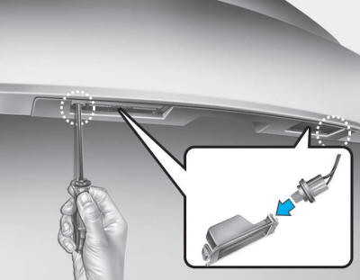 Hyundai Tucson: High mounted stop light. 1. Loosen the lens retaining screws with a philips head screwdriver.