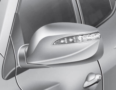 Hyundai Tucson: Outside rearview mirrors. Your vehicle is equipped with both lefthand and right-hand outside mirrors.