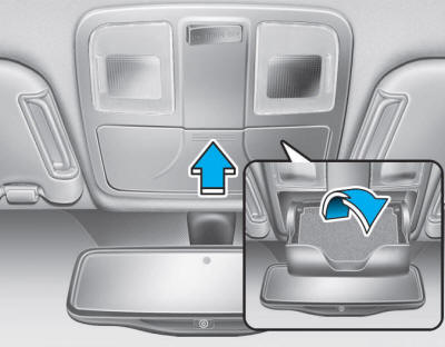 Hyundai Tucson: Storage compartments. To open the sunglass holder: