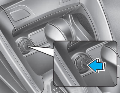 Hyundai Tucson: Cigarette lighter (if equipped). To use the cigarette lighter, the ignition switch must be in the ACC position