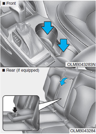 Hyundai Tucson: Cup holder. WARNING