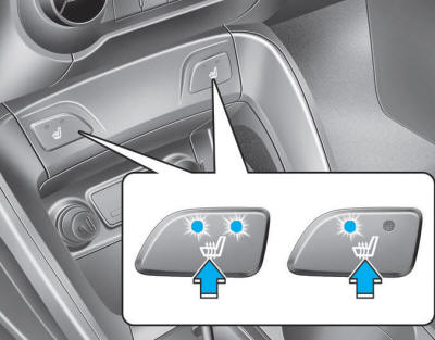 Hyundai Tucson: Seat warmers. While the engine is running, push either of the switches to warm the driver's
