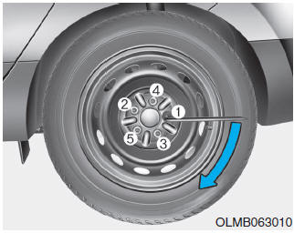Hyundai Tucson: If you have a flat tire. 13. Use the wheel lug nut wrench to tighten the lug nuts in the order shown.