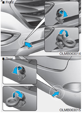 Hyundai Tucson: Towing service. 1.Open the tailgate, and remove the towing hook from the tool case.