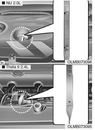 Hyundai Tucson: Engine oil. 6. Pull the dipstick out again and check the level. The level should be between