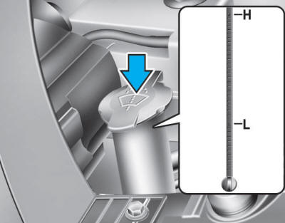 Hyundai Tucson: Washer fluid. Check the fluid level in the washer fluid reservoir and add fluid if necessary.