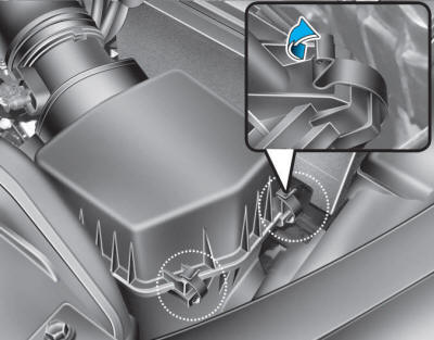 Hyundai Tucson: Air cleaner. 1. Loosen the air cleaner cover attaching clips and open the cover.